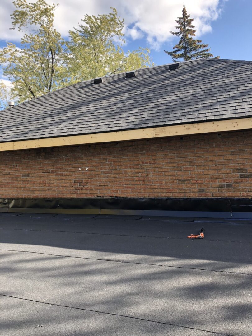 Flat roof and shingles in Toronto