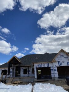 under construction house and blue sky